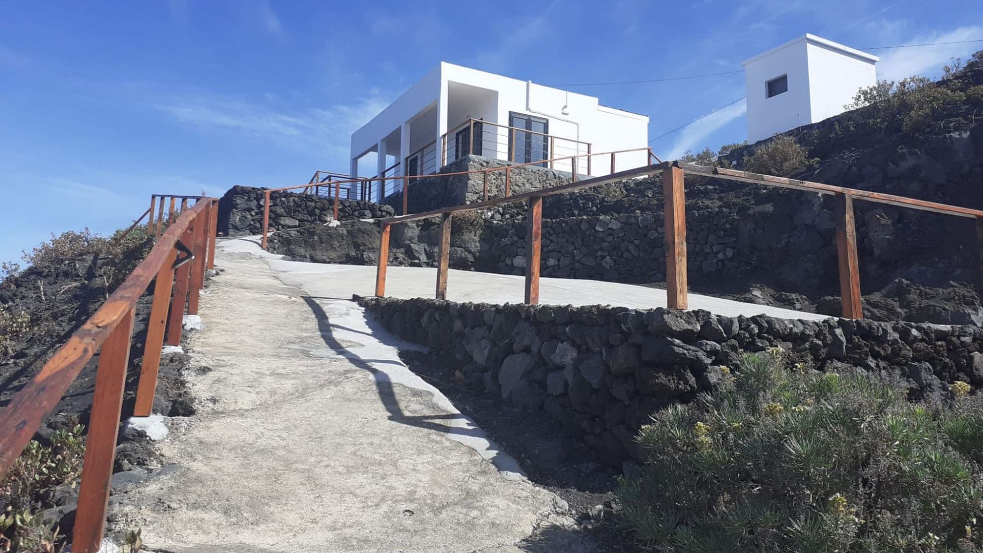 Casa Atlante entrance with ocean backdrop
